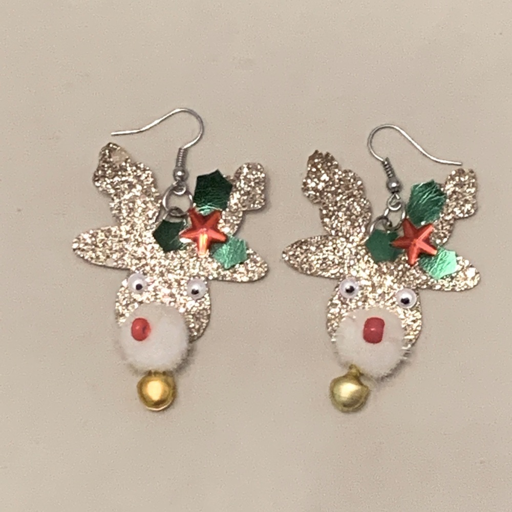 Gold reindeer holiday earrings